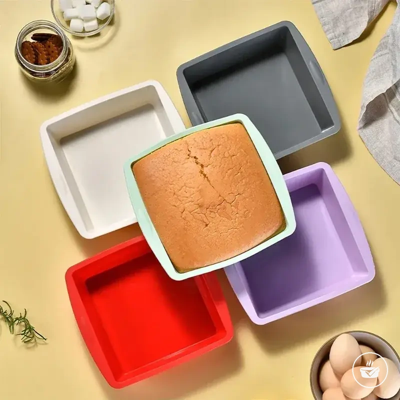 Square silicone brownie pan with anti-slip handles for oven and air fryer baking.