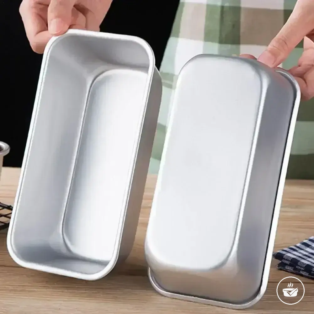 Minimolde rectangular de acero al carbono para pan, con superficie antiadherente.